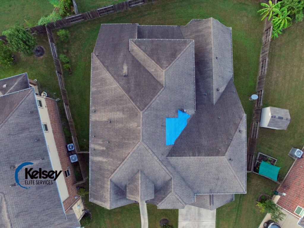 Before roof replacement in Sugar Land, TX showing an 8-year-old roof with extensive storm and leak damage.